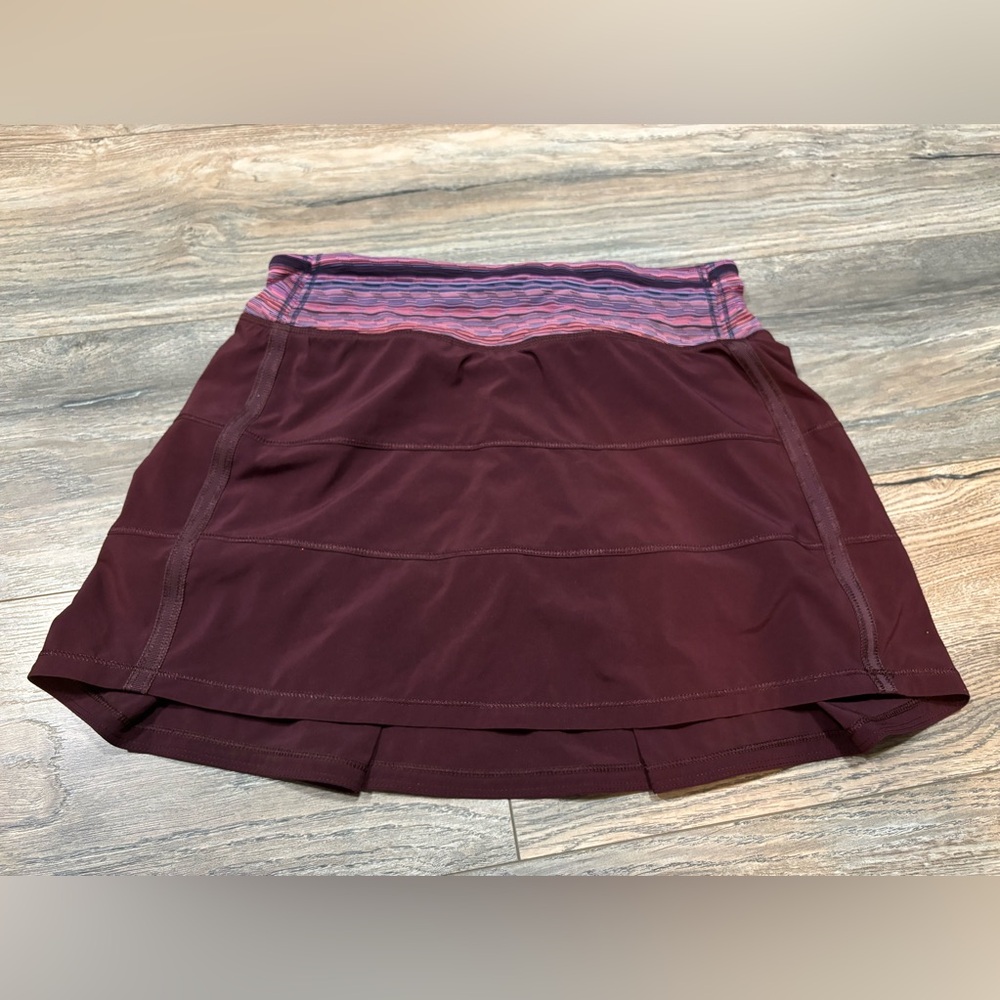 Lululemon Running skirt- like new! Size 4 tall. Purple w/ orange shorts